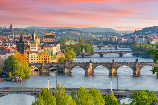 Scenic Prague panorama with bridges over Vltava at sunset, Czech Republic